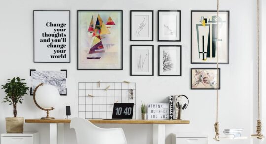 Modern home office wall art with motivational quotes and minimal aesthetic workspace design